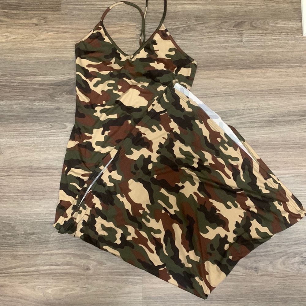 True Rock camouflage long maxi dress w/split.  Runs small midsection and hips.
